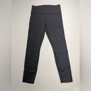 sku#163 Athleta Ultimate Stash Pocket 7/8 Leggings Black Size Small